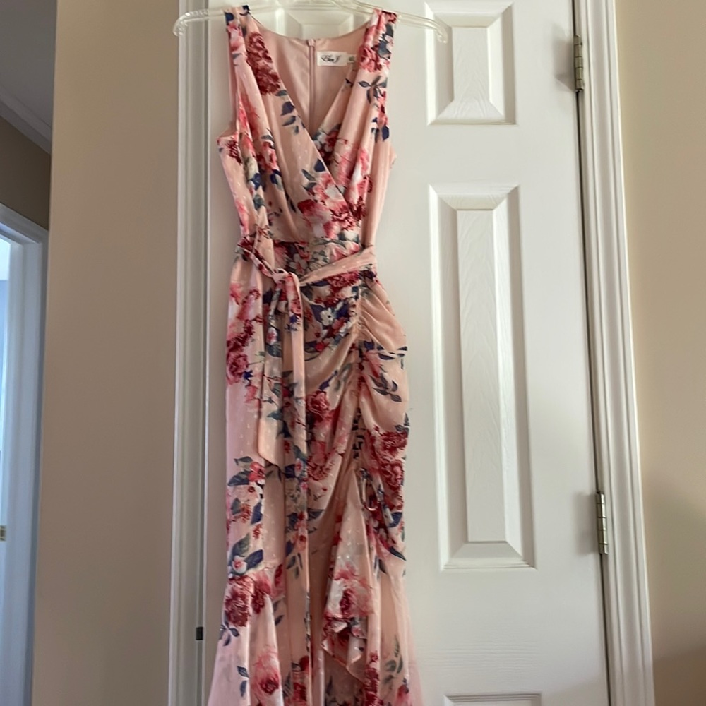 Eliza j size 6 dress worn once .  Dress has belt and rouging to the side